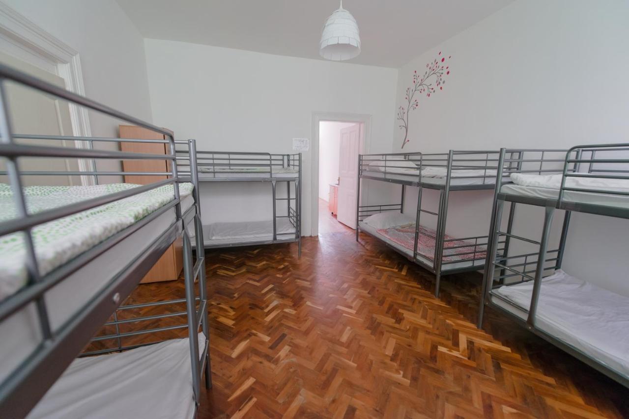 Bed in 14-Bed Dormitory Room with Shared Bathroom